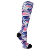 Dr. Scholl's women's compression socks featuring a blue, pink and white tie dye pattern and black accents at the heel and toe.