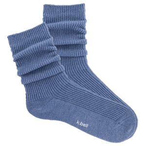 Blue ribbed women's slouch sock on a white background
