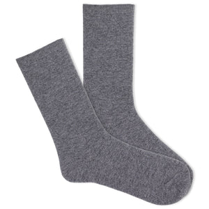 A pair of women's luxe crew socks in gray with a cashmere blend fabric.