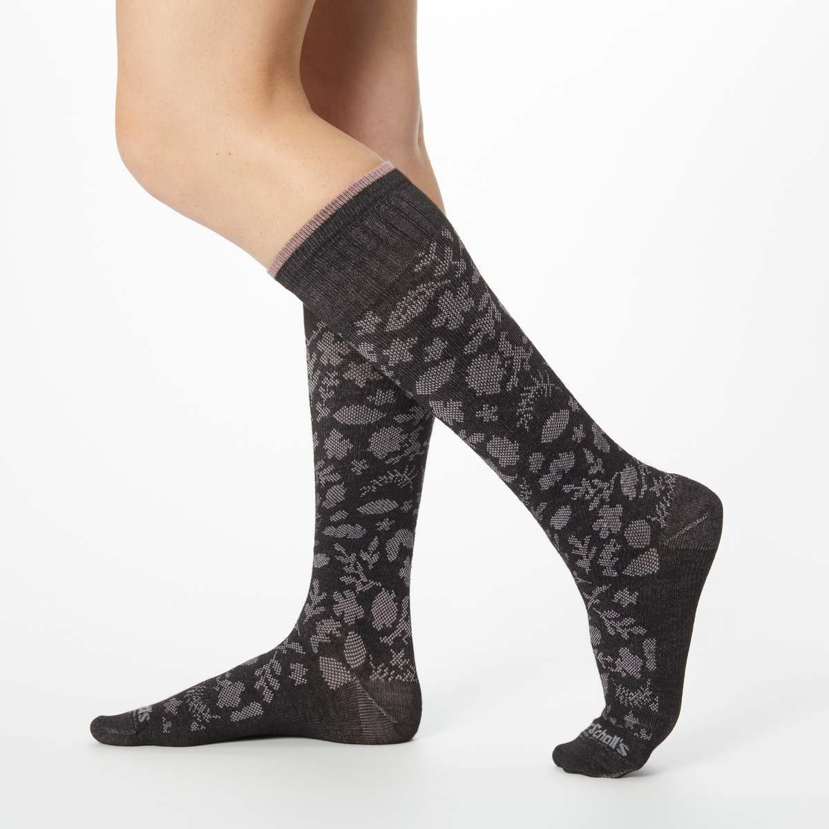 Dr. Scholl's women's compression socks in black with a grayish pink floral pattern.