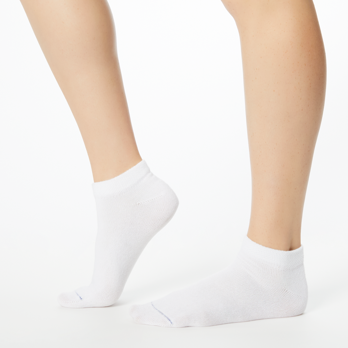 Woman wearing white Dr. Scholl's ankle socks