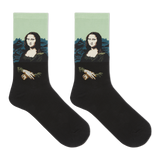 A pair of black crew socks featuring a printed graphic of the Mona Lisa with a light green background and blue mountains. thumbnail