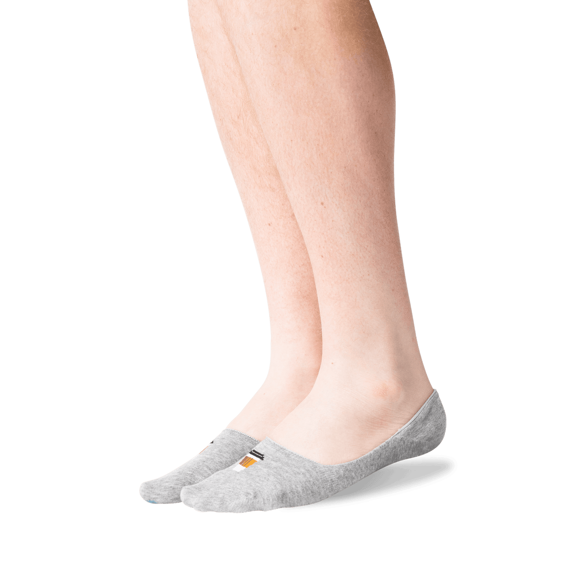 A pair of light gray low-cut no-show socks worn on a person's feet, shown against a plain white background.