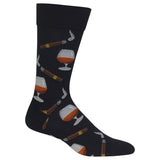 A single black crew sock with a repeating pattern of cognac glasses and cigars, shown on a plain white background.