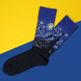 Pair of socks with 'Starry Night' design on a yellow and blue background thumbnail
