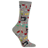 A single gray crew sock with a colorful pattern of sewing-themed icons including black sewing machines, red hearts, green scissors, yellow spools, and red thread spools, shown on a plain white background. thumbnail