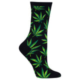 A single black crew sock with an all-over green and yellow cannabis leaf pattern, shown on a plain white background. thumbnail