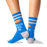 A pair of blue crew socks with gray stripes and heels/toes, featuring a croissant graphic and the text 'CHALLAH BACK GIRL' worn on a person's feet against a white background. thumbnail