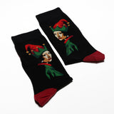 Pair of socks with elf design on a white background