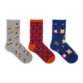 Three pairs of patterned crew socks displayed side by side on a plain white background. The left sock is heather gray with cartoon skateboarder prints.