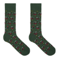A pair of dark green crew socks with an all-over golf course pattern featuring red and white golf carts, golf balls, flags, and a golfer, displayed against a solid white background.