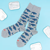 Gray socks with blue fish pattern on a light blue background thumbnail