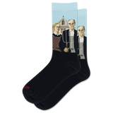 A pair of black crew socks with a light blue upper cuff featuring a graphic print of Grant Woods' "American Gothic" painting. The word 'HOTSOX' is printed in red on the toe area of the front sock.