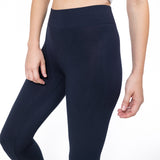Black leggings worn by a person on a white background thumbnail