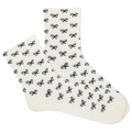 White women's socks with black bow pattern on a white background