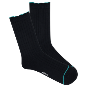 Pair of black K.bell socks with blue trim detailing on a white background