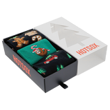 Three pairs of Christmas-themed socks in a 'HOTSOX' box on a white background thumbnail