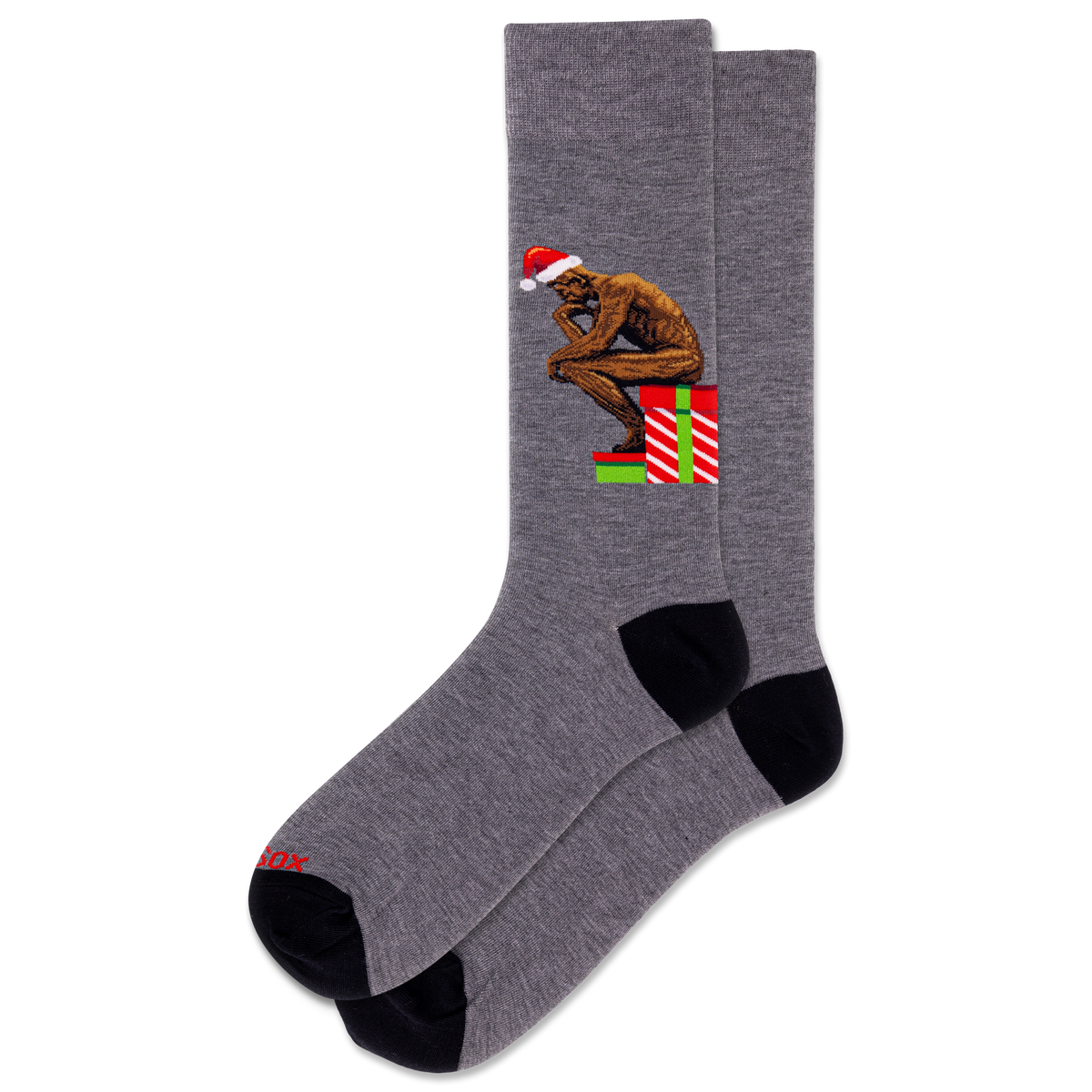 Gray sock with a Christmas-themed design featuring a figure and presents on a white background