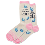 Beige socks with pink accents and blue dreidel designs, featuring text on a white background. thumbnail