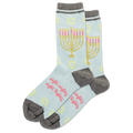 Light blue socks with Menorah design and 'eight nights' text on a white background