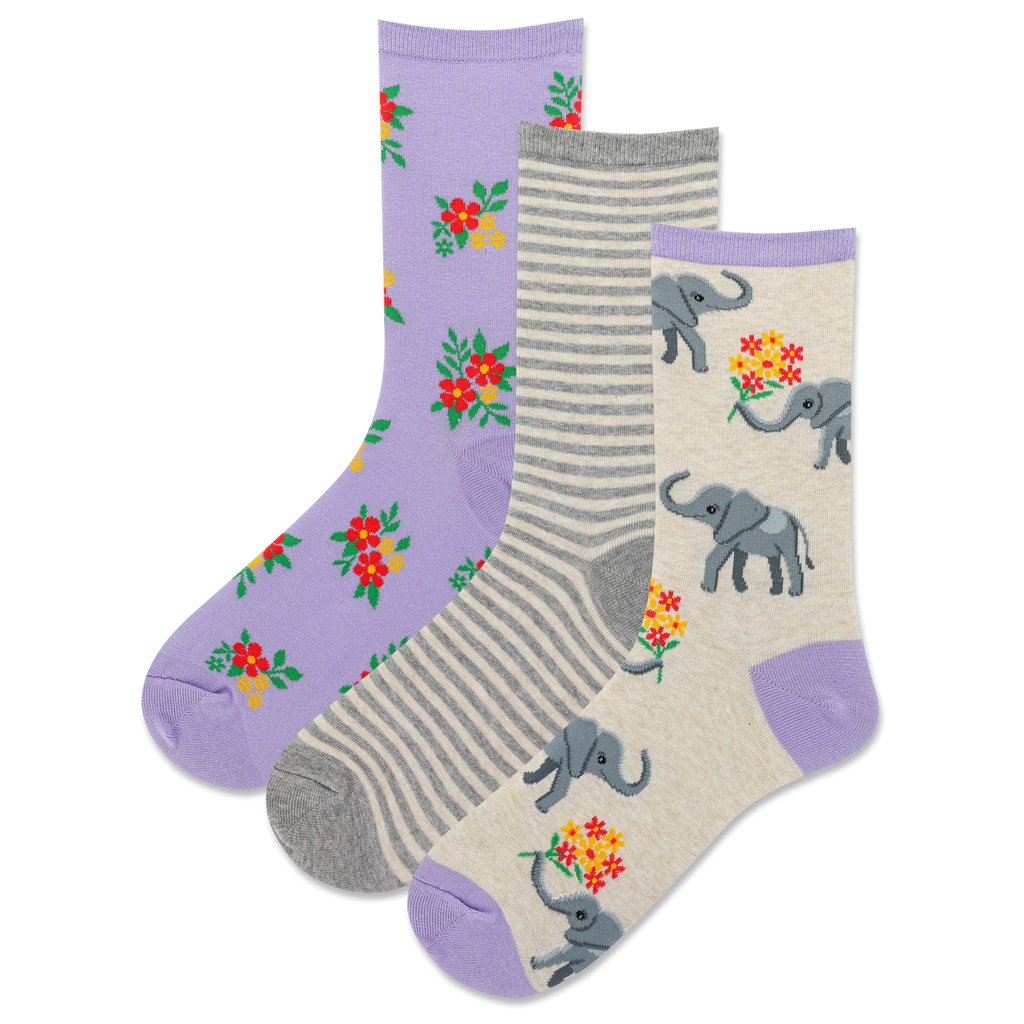 Three pairs of socks with elephant and floral patterns on a white background