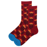 Red socks with orange and black floral pattern on a white background
