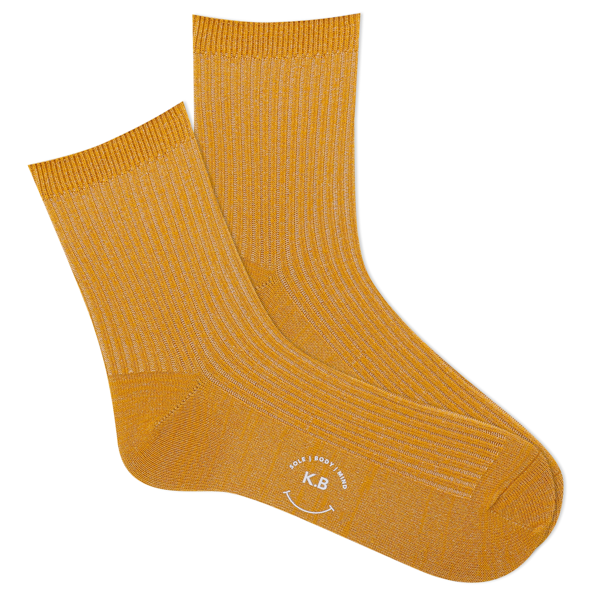 Pair of metallic gold socks with a K.Bell  logo on a white background