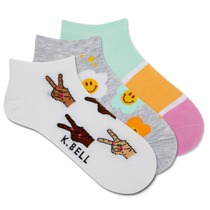 Three pairs of low cut socks with various colorful designs and text readings 'K.Bell'.