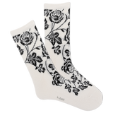 White socks with black floral patterns on a white background