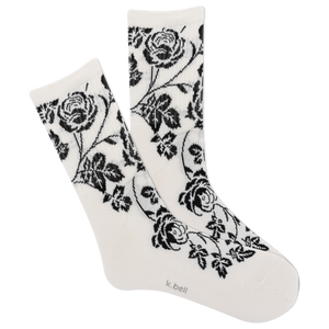 White socks with black floral patterns on a white background
