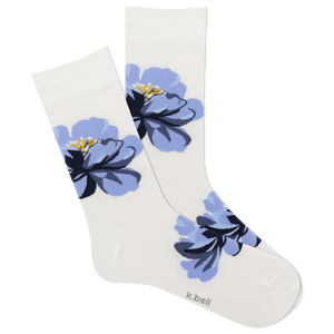 A pair of white crew socks with a blue floral pattern.