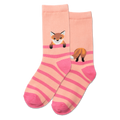 Person wearing pink and beige striped socks with fox designs on a gray floor.