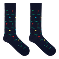 A pair of navy crew socks with a pattern of golf flags.